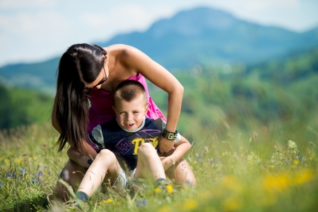 mother and son sitting and playingの写真素材