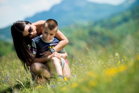 mother and son sitting and playingの写真素材