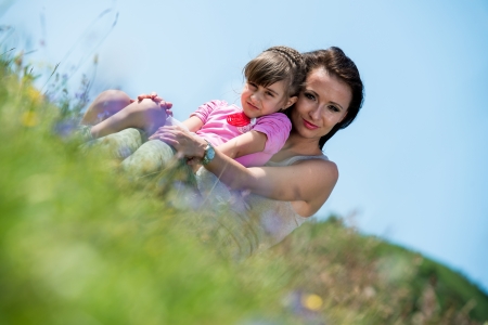 mother and daughter huggingの写真素材