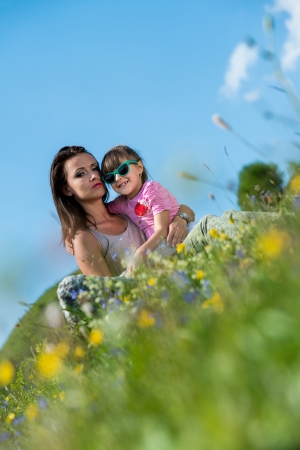 mother and daughter huggingの写真素材
