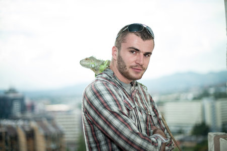 portrait of the young man with the iguana