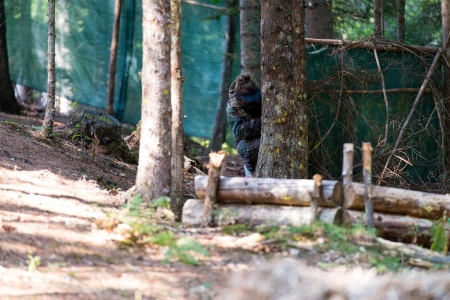 Paintball player Hidingの写真素材