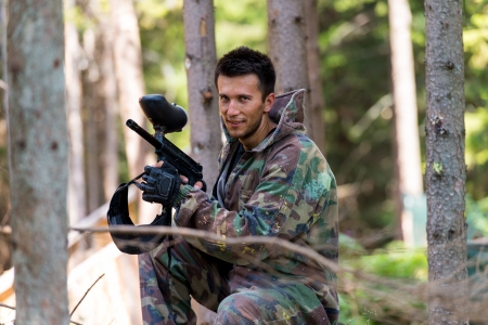 Players in paintball prepare for fightの写真素材