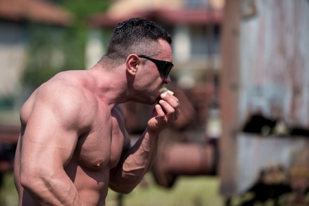 Muscular Man Eating Pancakesの写真素材