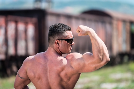 Man Athlete Showing Bicepsの写真素材