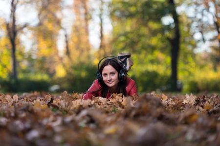Young Woman Listening To Music In Natureの写真素材
