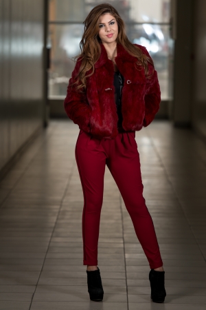 Glamour Fashion Model Wearing Red Pants And Jacketの写真素材
