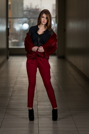 Glamour Fashion Model Wearing Red Pants And Jacketの写真素材