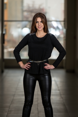 Fashion Girl Wearing Leather Pants And Long Sleeveの写真素材