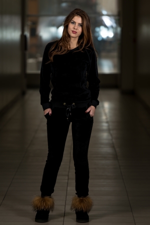 Beautiful Woman Wearing Fashion Tracksuit In Blackの写真素材