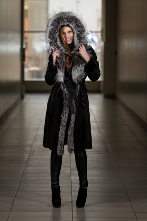 Fashion Model Wearing Long Fur Coatの写真素材