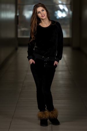 Beautiful Woman Wearing Fashion Tracksuit In Blackの写真素材