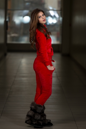 Beautiful Woman Wearing Fashion Track Suit In Redの写真素材