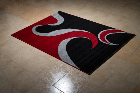 Single Red Carpet Folded On Floorの写真素材