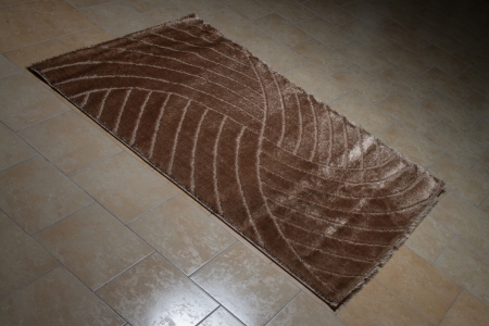 Brown Pattern Carpet Lying On Floorの写真素材
