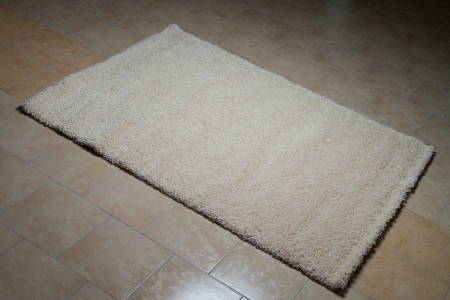 White Carpet Lying On Floorの写真素材