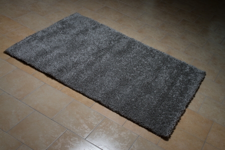 Black Carpet Lying On Floorの写真素材