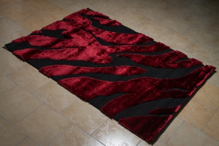Single Red Carpet Folded On Floorの写真素材