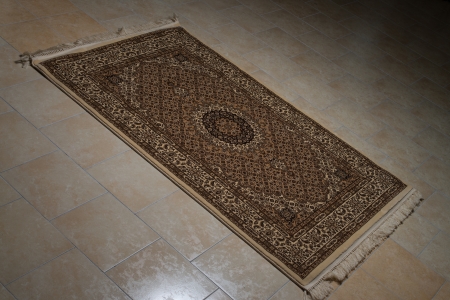 Persian Rug Isolated On Tilesの写真素材