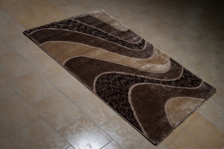 Brown Pattern Carpet Lying On Floorの写真素材