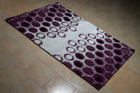 Single Purple Carpet Folded On Floorの写真素材