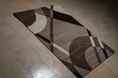 Brown Pattern Carpet Lying On Floorの写真素材
