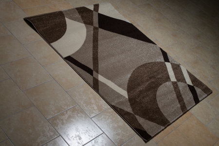 Brown Pattern Carpet Lying On Floorの写真素材