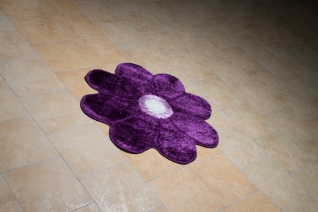 Single Purple Carpet Folded On Floorの写真素材