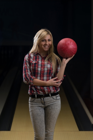 Women Holding A Bowling Ballの写真素材