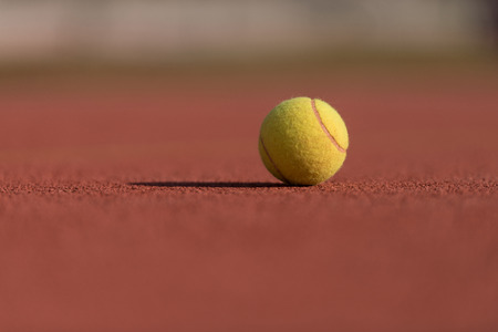 Tennis Ball on the Court Close upの写真素材
