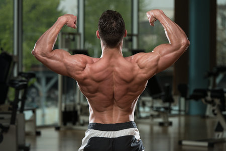 Body Builder Performing Rear Double Biceps Pose