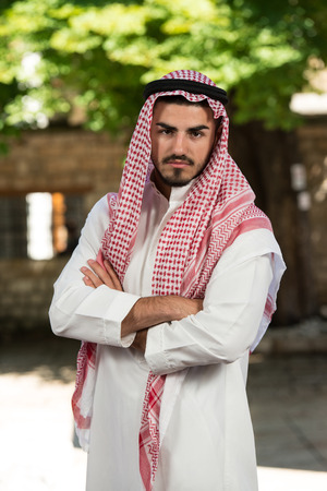 Young Businessman Wearing A Traditional Cap Dishdashaの写真素材