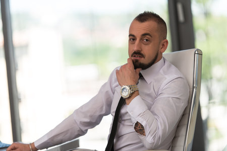 Portrait Of A Young Business Man In His Officeの写真素材