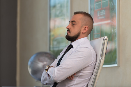 Portrait Of A Young Business Man In His Officeの写真素材