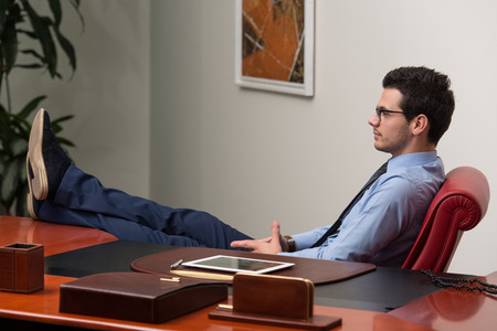 Happy Young Business Man Work In Modern Office On Computerの写真素材