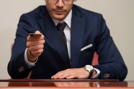 Businessman In Business Suit Pay By Credit Cardの写真素材