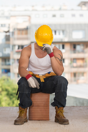 Construction Worker Relaxing The Fresh Air During Workの写真素材