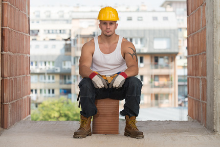 Construction Worker Relaxing The Fresh Air During Workの写真素材