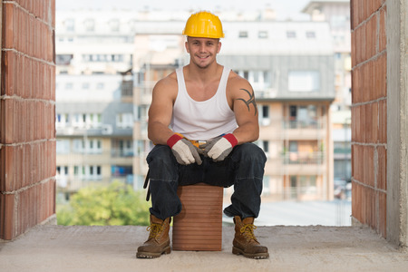 Construction Worker Relaxing The Fresh Air During Workの写真素材