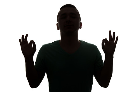 Typical Upper Body Man Silhouette Wearing A T-Shirt - Mysterious Face - Isolated On White Backgroundの写真素材