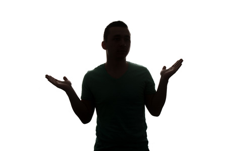 Typical Upper Body Man Silhouette Wearing A T-Shirt - Mysterious Face - Isolated On White Backgroundの写真素材