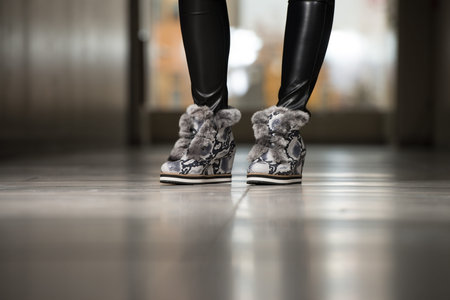 Young Shopper Woman Walking In Shopping Mall - Close-Up Of Legs And Shoes