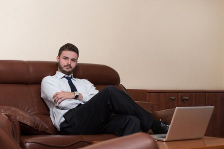 Portrait Of A Handsome Casual Businessman Smilingの写真素材