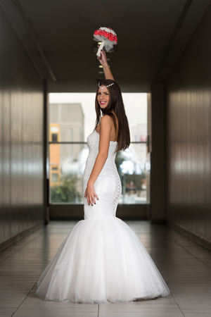 Beautiful Bride In Her Wedding Dressの写真素材