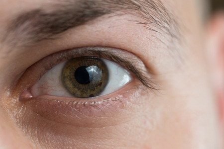 Extreme Closeup Shot Of A Beautiful Man Eyeの写真素材