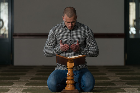 Muslim Man Is Reading The Koranの写真素材