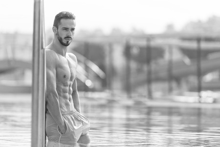 Fashion Portrait Of A Very Muscular Sexy Man In Underwear At Swimming Poolの写真素材