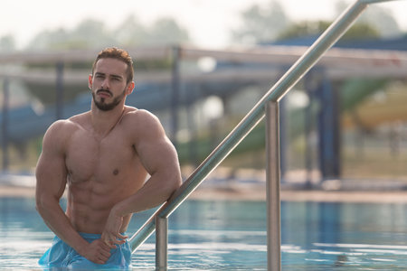 Fashion Portrait Of A Very Muscular Sexy Man In Underwear At Swimming Pool