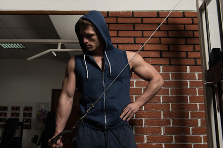 Young Bodybuilder Doing Heavy Weight Exercise For Triceps