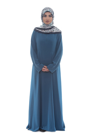 Attractive Arabic Woman With Arms Crossed On White Backgroundの写真素材